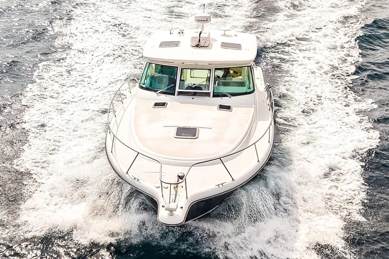 Slide: The Image of 2005 Tiara Yachts 3800 Open cruising on the ocean, aerial view. - 6