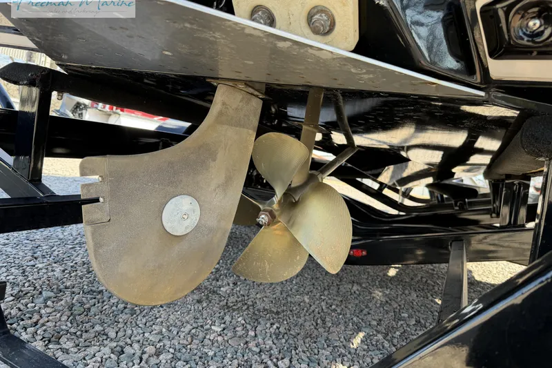 Slide: The Image of Close-up of 2022 Nautique Super Air Nautique G23 propeller and hull details. - 11