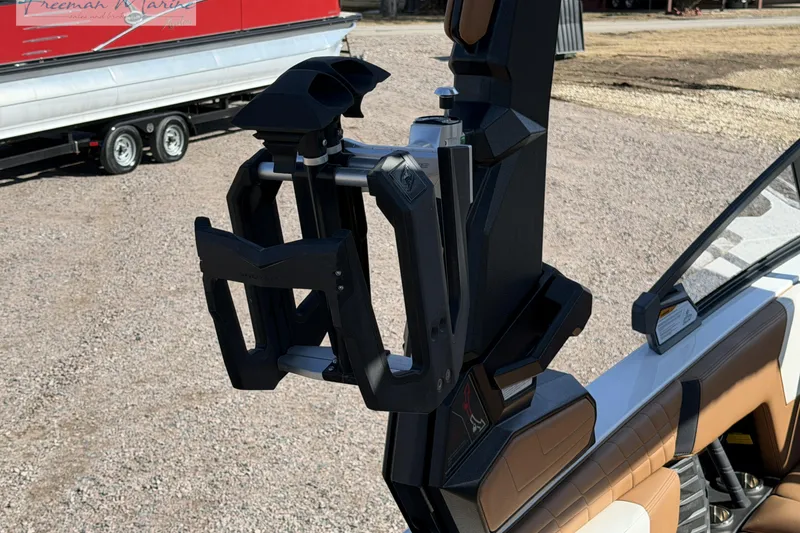 Slide: The Image of Open storage compartment in 2022 Nautique Super Air Nautique G23 boat. - 25