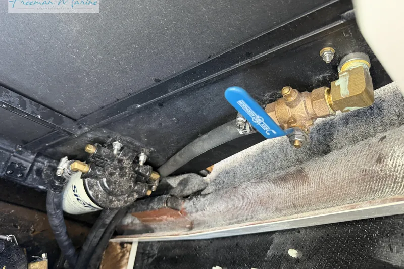 Slide: The Image of Engine compartment of 2022 Nautique Super Air Nautique G23 boat. - 31