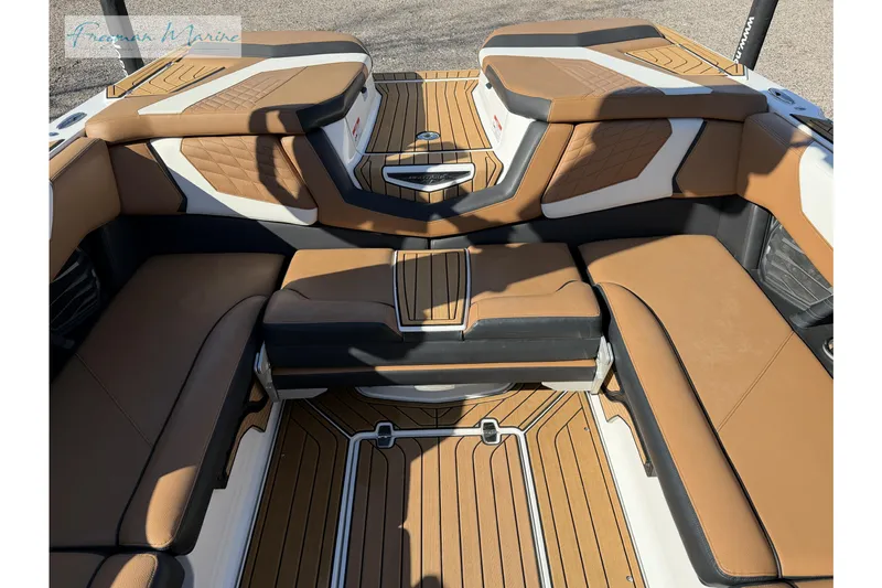 Slide: The Image of 2022 Nautique Super Air Nautique G23 boat speakers and tower detail under clear sky. - 37
