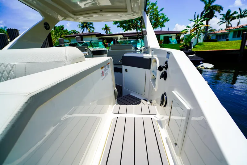 Slide: The Image of 2022 Sea Ray SLX 310 OB boat interior with sleek design and modern features. - 8