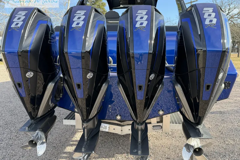 Slide: The Image of 2024 Cigarette 41' Nighthawk with four powerful 500R outboard engines. - 13