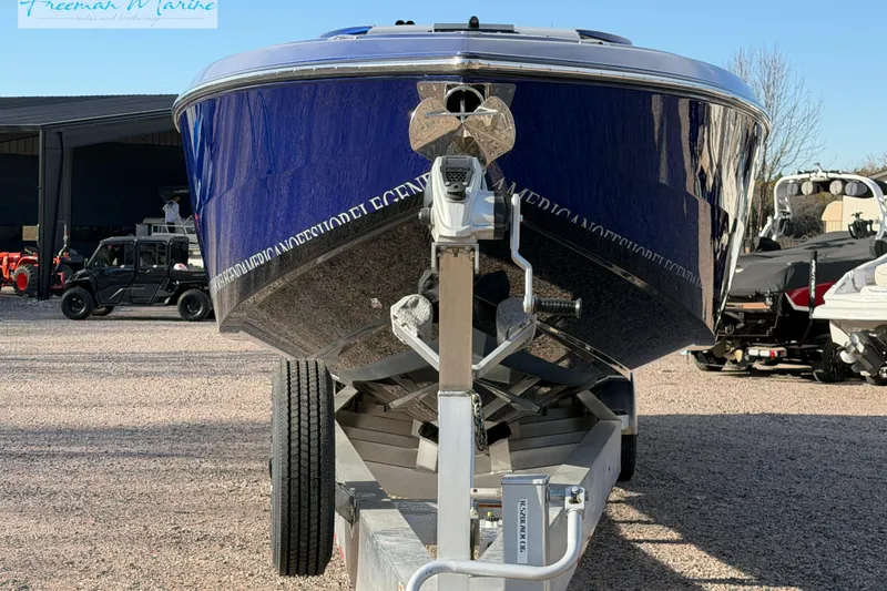 Slide: The Image of 2024 Cigarette 41' Nighthawk boat on trailer, front view, in outdoor setting. - 20