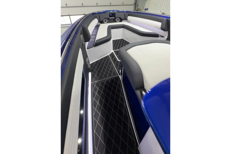 Slide: The Image of 2024 Cigarette 41' Nighthawk boat interior with sleek seating and modern design. - 23