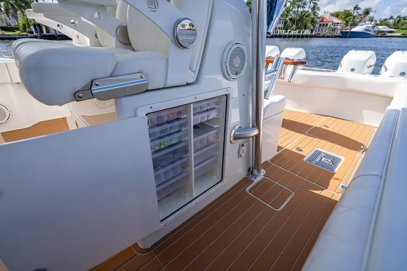 Slide: The Image of Control panel of a 2019 Freeman 42LR boat with navigation screens and steering wheel. - 29