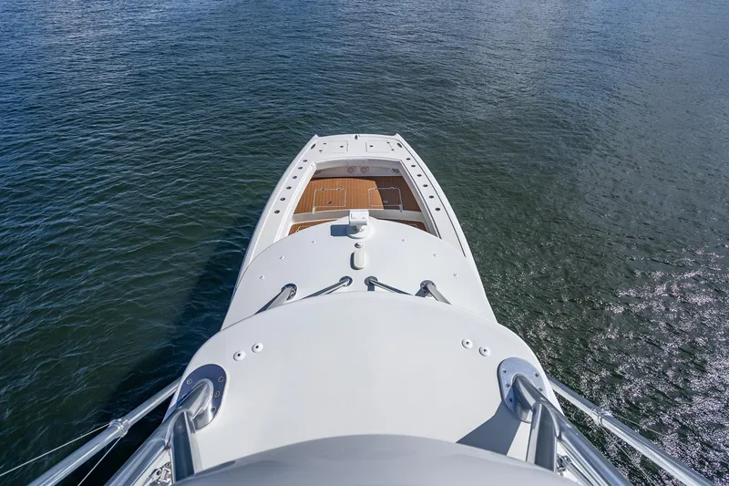Slide: The Image of 2019 Freeman 42LR boat interior with white seating and stainless steel railing. - 45