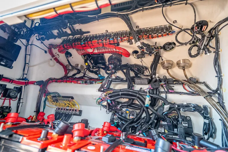 Slide: The Image of Electrical wiring and components inside a 2019 Freeman 42LR boat. - 53