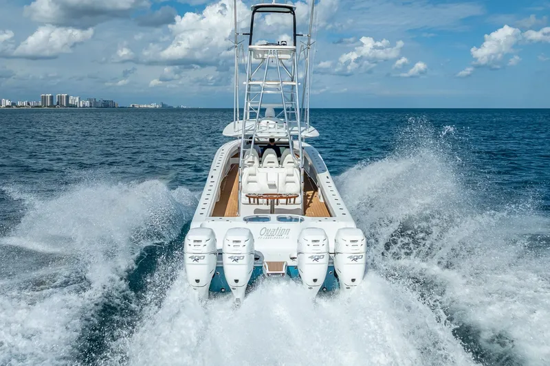 Slide: The Image of Aerial view of 2019 Freeman 42LR boat on blue ocean water. - 9