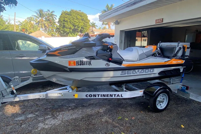 The Image of 2022 Sea-Doo FishPro Trophy 170 on trailer, parked in driveway. - 0