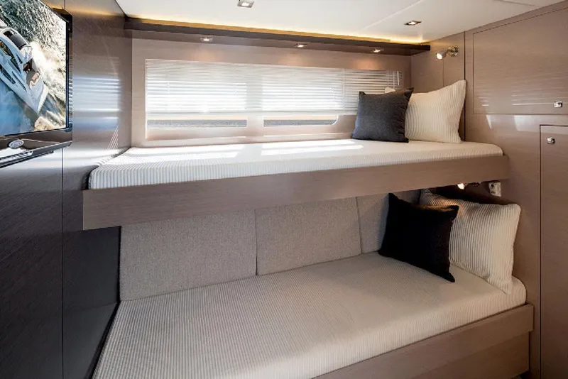 Slide: The Image of Manufacturer Provided Image: 2022 Cruisers Yachts 60 Cantius interior with bunk beds and modern design. - 15