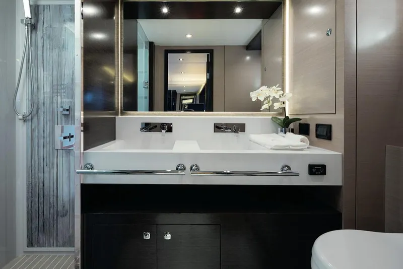 Slide: The Image of Manufacturer Provided Image: Modern bathroom in 2022 Cruisers Yachts 60 Cantius with double sink and shower. - 21