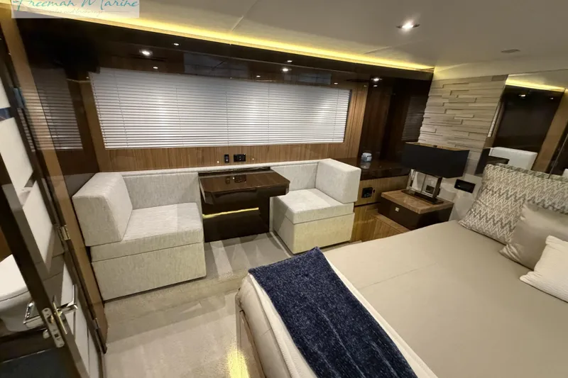 Slide: The Image of Luxurious interior of 2022 Cruisers Yachts 60 Cantius with modern seating and elegant decor. - 28