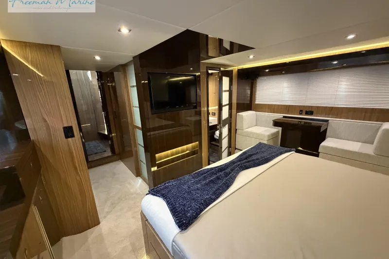 Slide: The Image of Luxurious interior of 2022 Cruisers Yachts 60 Cantius with modern furnishings and ambient lighting. - 29