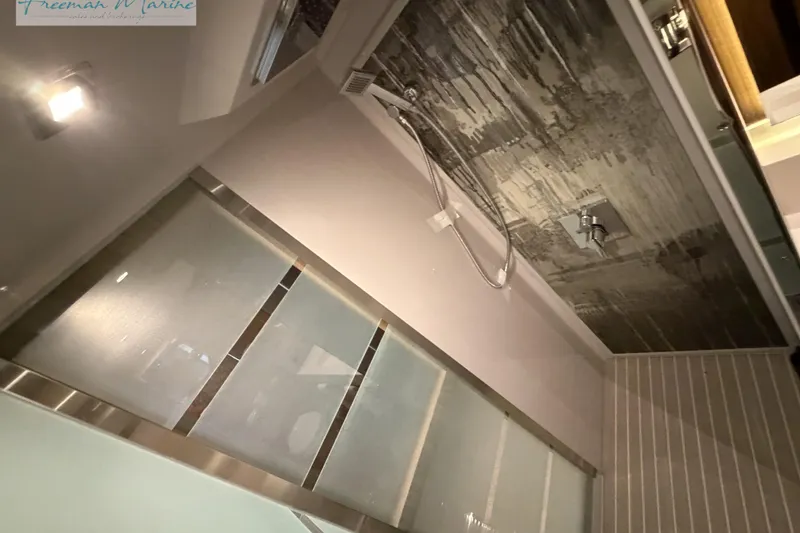 Slide: The Image of Modern shower area in 2022 Cruisers Yachts 60 Cantius with sleek design. - 32