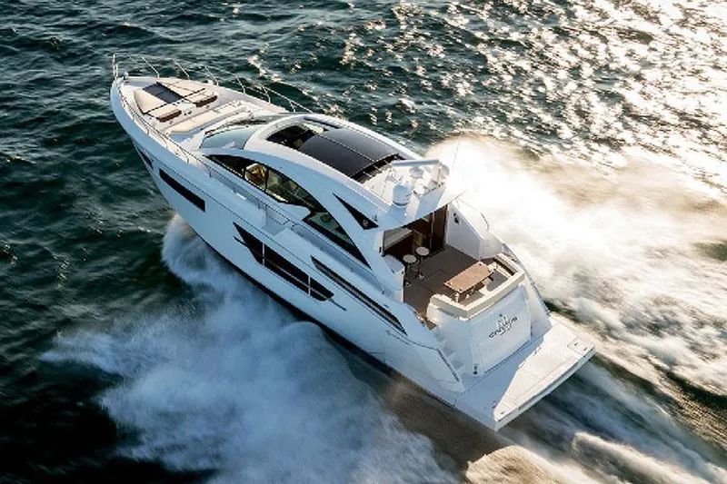 Slide: The Image of Manufacturer Provided Image: 2022 Cruisers Yachts 60 Cantius luxury yacht cruising on open water. - 5