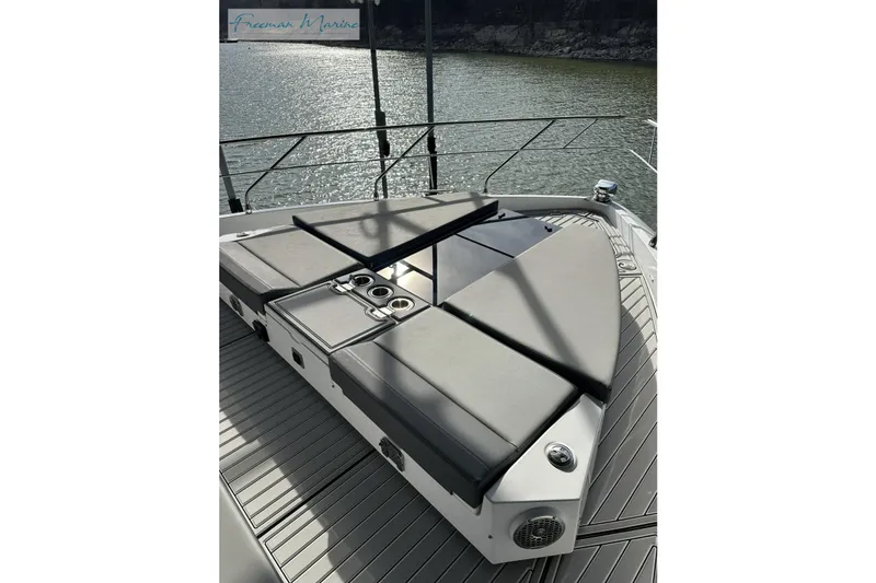 Slide: The Image of Luxurious 2022 Cruisers Yachts 60 Cantius with sleek deck seating and cup holders. - 50