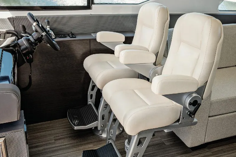 Slide: The Image of Manufacturer Provided Image: Captain's chairs in the 2022 Cruisers Yachts 60 Cantius cockpit. - 12