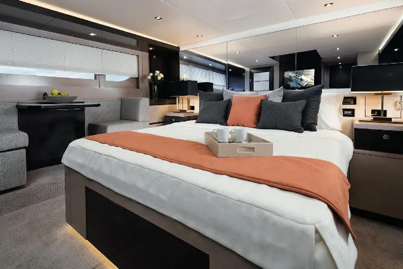 Slide: The Image of Manufacturer Provided Image: Luxurious bedroom interior of 2022 Cruisers Yachts 60 Cantius with modern decor. - 17