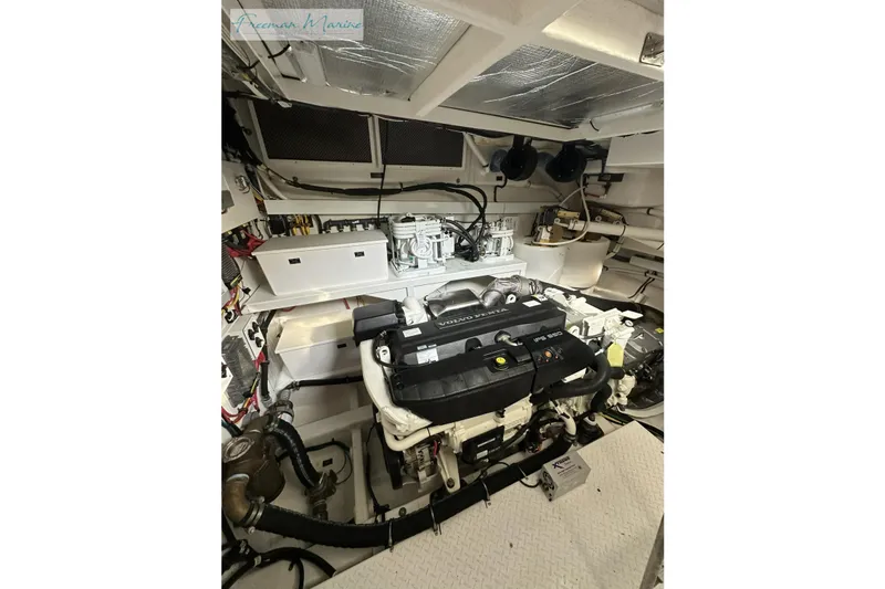 Slide: The Image of Engine room of 2022 Cruisers Yachts 60 Cantius with Volvo Penta engine. - 60