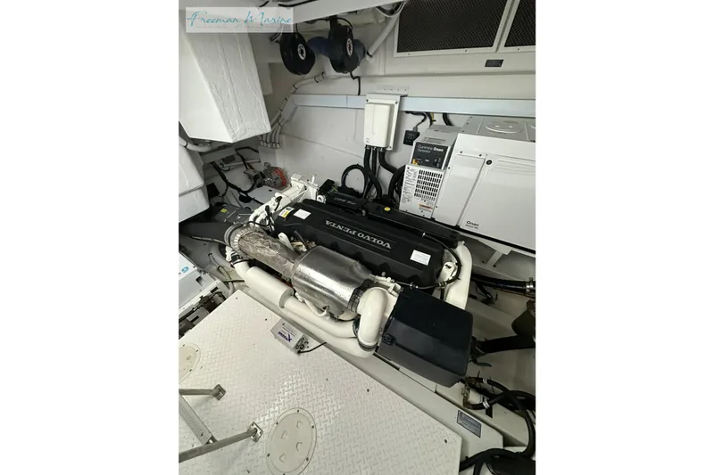 Slide: The Image of Engine room of 2022 Cruisers Yachts 60 Cantius with Volvo Penta engine. - 64