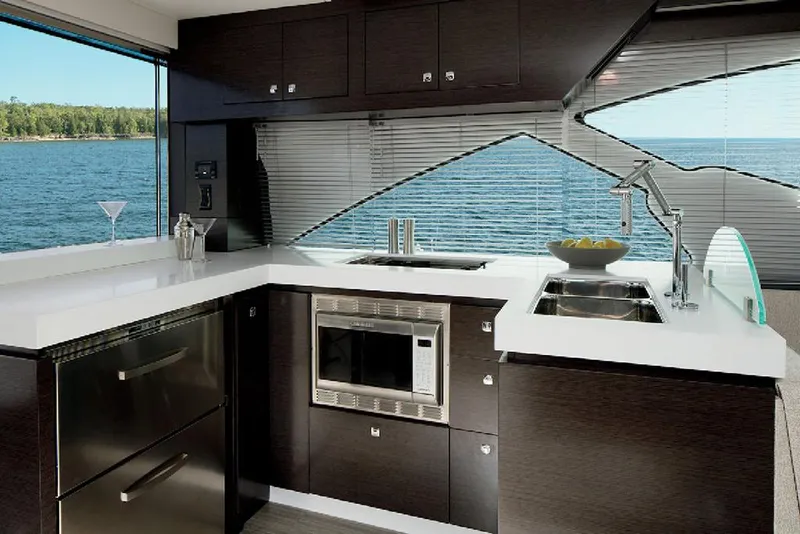 Slide: The Image of Manufacturer Provided Image: Modern kitchen in 2022 Cruisers Yachts 60 Cantius with ocean view. - 9