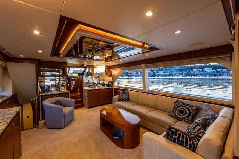 Slide: The Image of Luxurious interior of 2017 Ocean Alexander 72 Pilothouse yacht with scenic waterfront view. - 25