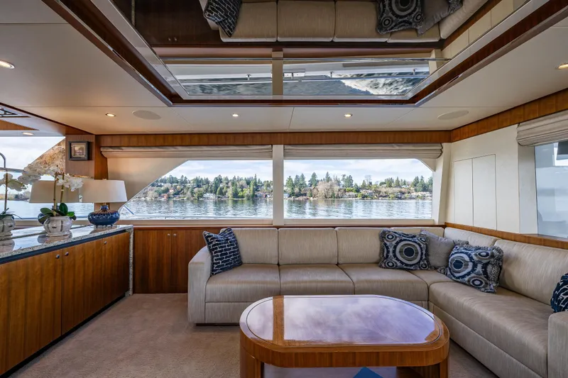 Slide: The Image of Luxurious interior of 2017 Ocean Alexander 72 Pilothouse yacht with scenic water view. - 26