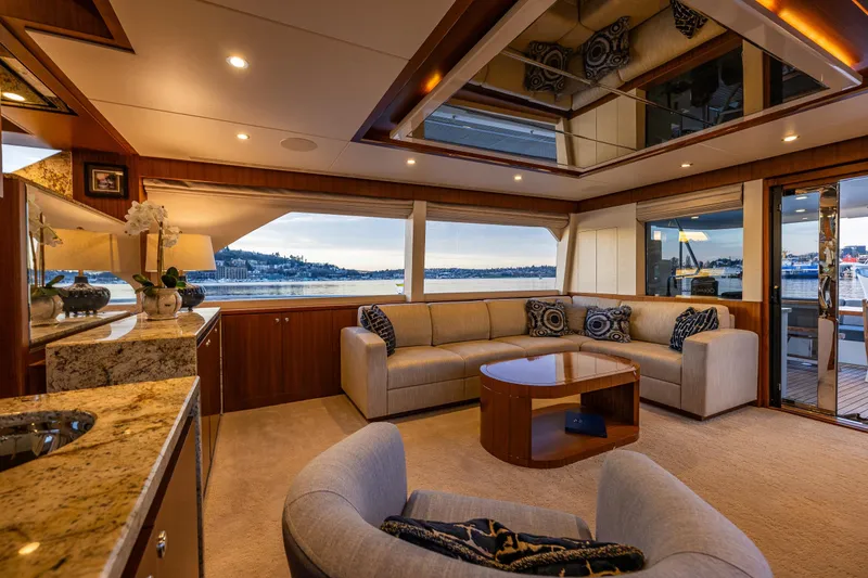 Slide: The Image of Luxurious interior of 2017 Ocean Alexander 72 Pilothouse yacht with elegant seating and scenic views. - 27