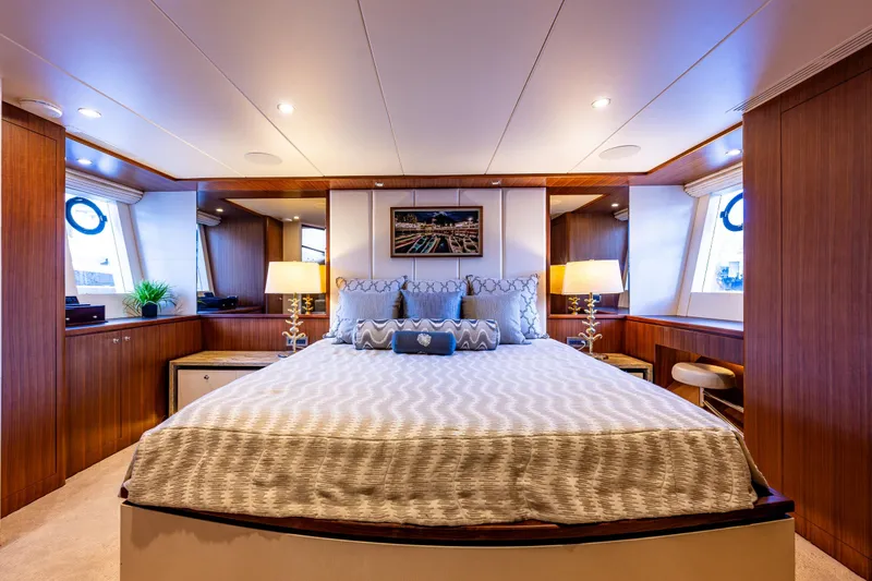 Slide: The Image of Luxurious bedroom interior of 2017 Ocean Alexander 72 Pilothouse yacht with elegant wood finishes. - 38