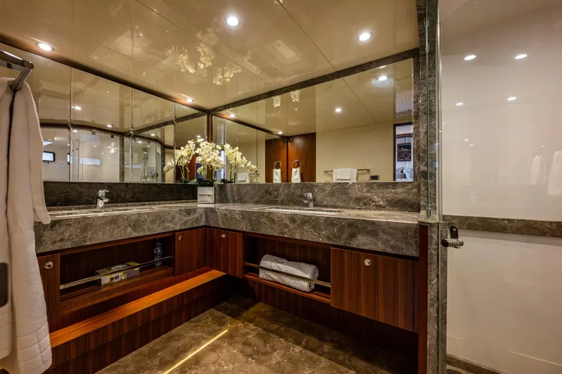 Slide: The Image of Luxurious bathroom in 2017 Ocean Alexander 72 Pilothouse yacht with marble countertops. - 43