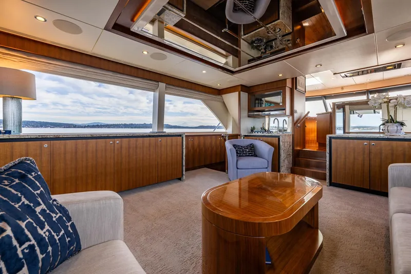 Slide: The Image of Luxurious interior of 2017 Ocean Alexander 72 Pilothouse yacht with elegant wood finishes. - 52