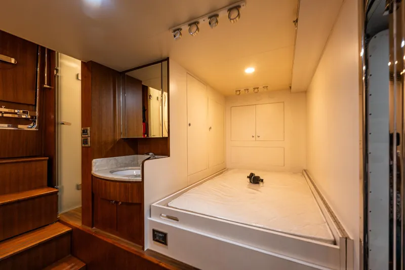 Slide: The Image of Luxurious interior of 2017 Ocean Alexander 72 Pilothouse yacht with cozy sleeping area. - 58