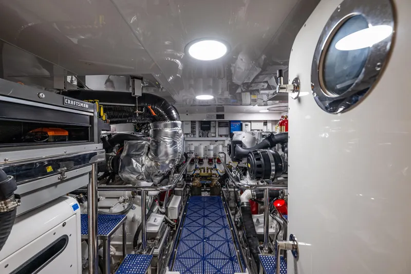 Slide: The Image of Engine room of 2017 Ocean Alexander 72 Pilothouse yacht, featuring advanced machinery and equipment. - 62