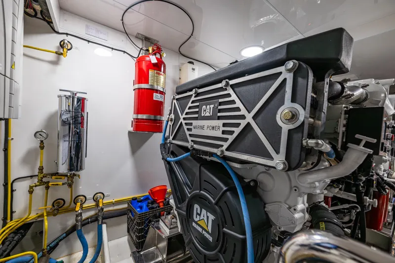Slide: The Image of Engine room of 2017 Ocean Alexander 72 Pilothouse with CAT marine power engine. - 71
