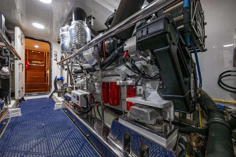 Slide: The Image of Engine room of 2017 Ocean Alexander 72 Pilothouse yacht, showcasing machinery and equipment. - 72