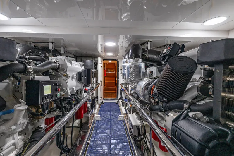 Slide: The Image of Engine room of 2017 Ocean Alexander 72 Pilothouse yacht, featuring advanced machinery and equipment. - 74