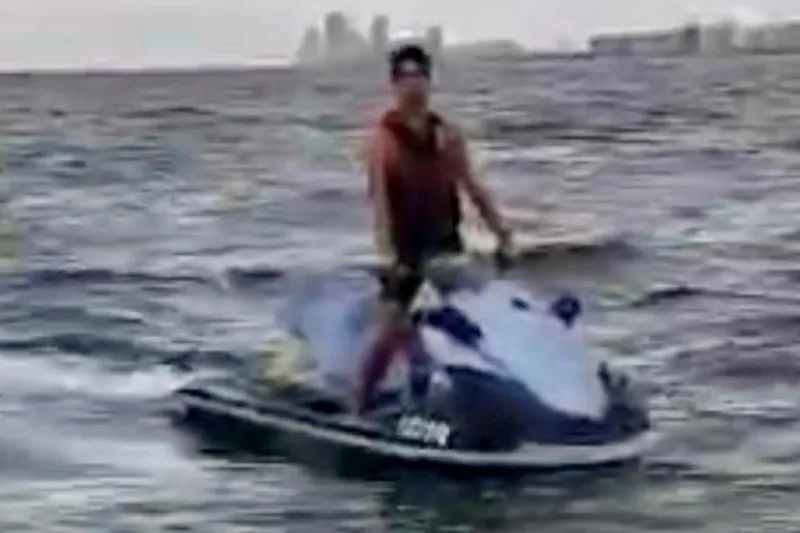 Slide: The Image of Person riding a 2011 Yamaha WaveRunner VX Cruiser on the ocean. - 5