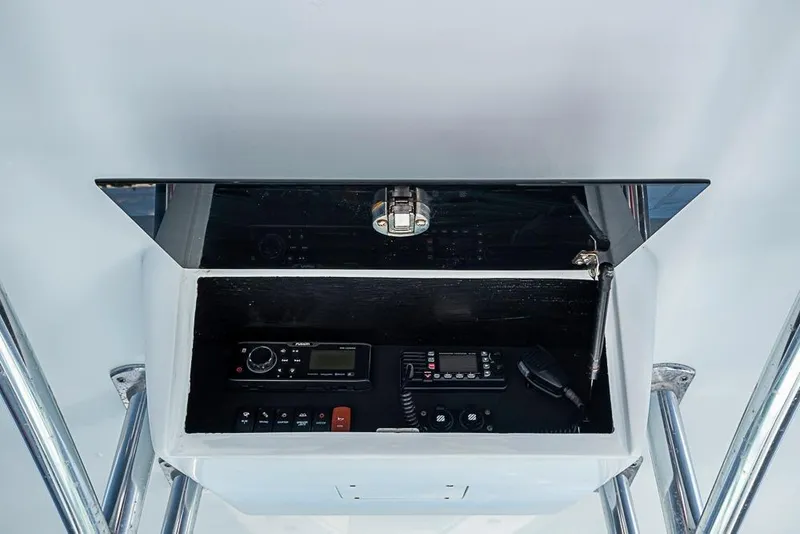 Slide: The Image of Control panel of 2000 Regulator 26 Forward Seating boat with radio equipment. - 7
