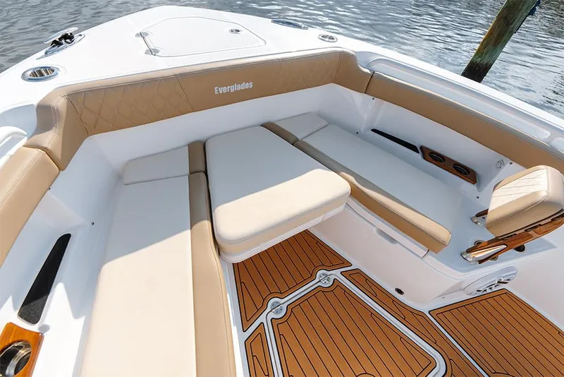 Slide: The Image of Manufacturer Provided Image: 2025 Everglades 315 Center Console boat with tan seating and teak flooring. - 4
