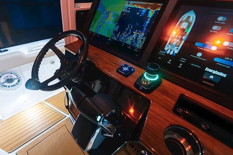 Slide: The Image of Manufacturer Provided Image: 2025 Everglades 315 Center Console dashboard with advanced navigation displays. - 8