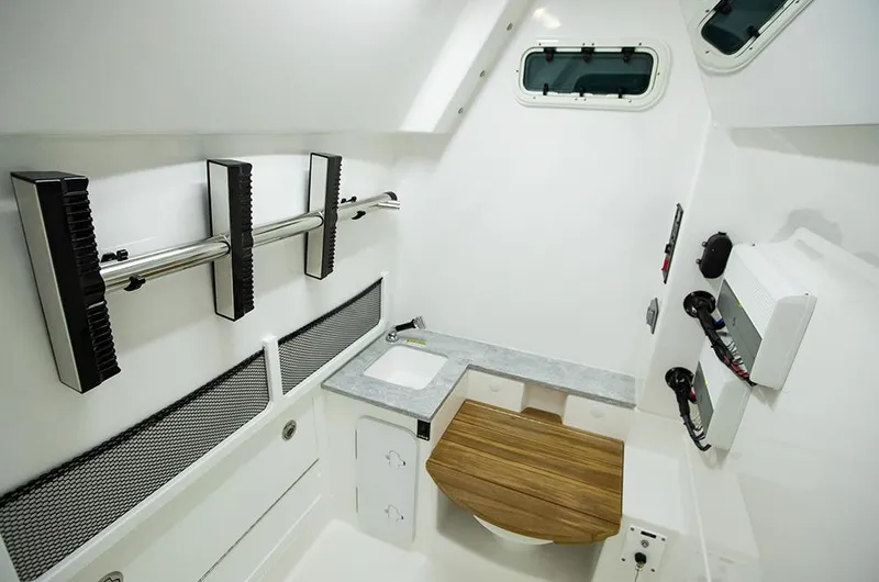 Slide: The Image of Manufacturer Provided Image: 2025 Everglades 335 Center Console interior with modern amenities and sleek design. - 13