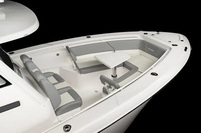 Slide: The Image of Manufacturer Provided Image: 2025 Everglades 335 Center Console boat with sleek seating and table design. - 4