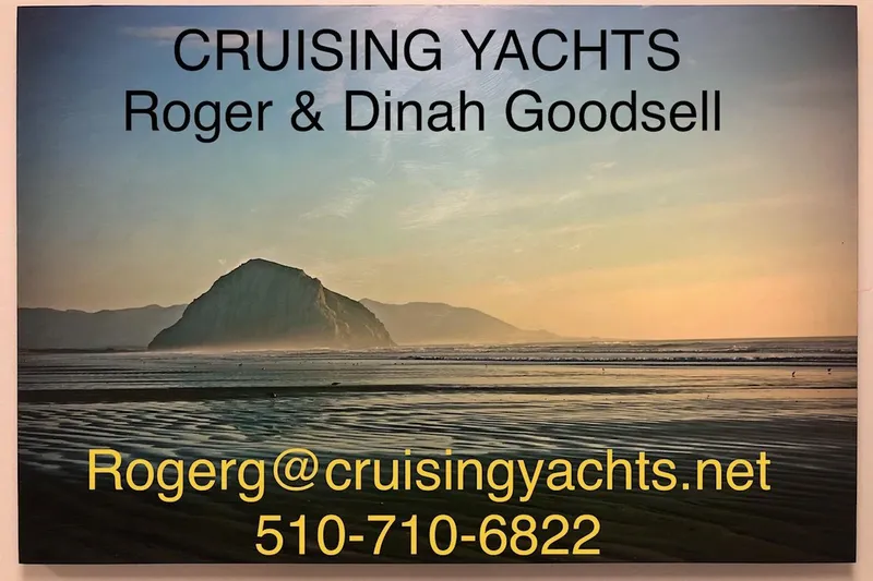 Slide: The Image of Cruising Yachts contact information over scenic coastal view, promoting Beneteau 361, 2003 model. - 21