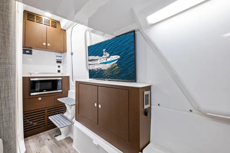 Slide: The Image of Interior of 2026 Everglades 375 Center Console with modern amenities and sleek design. - 22