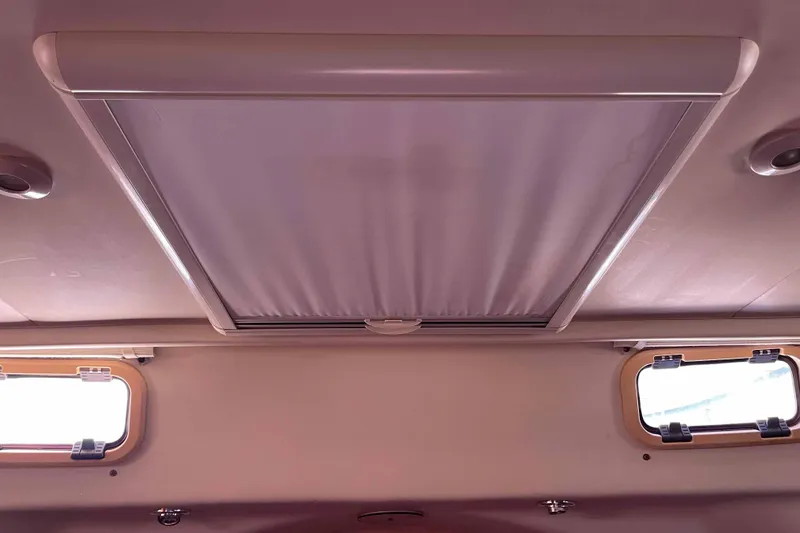 Slide: The Image of Luxurious cabin interior of 2010 Hunter 45 Center Cockpit yacht with colorful bedding. - 14