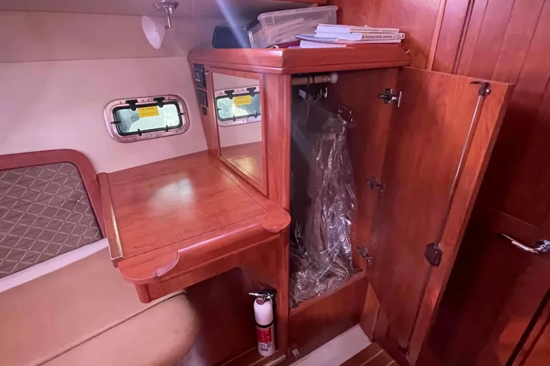 Slide: The Image of Luxurious cabin interior of 2010 Hunter 45 Center Cockpit yacht with vibrant bedding. - 20