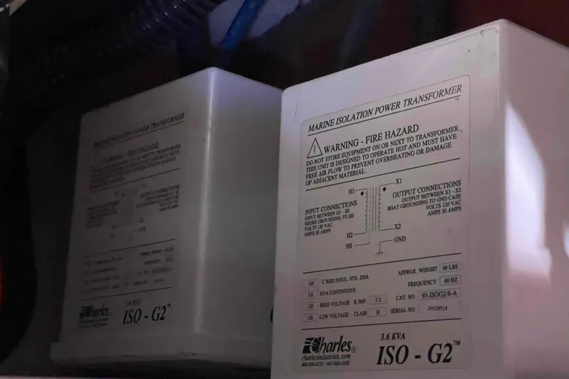 Slide: The Image of Interior storage compartment of 2010 Hunter 45 Center Cockpit sailboat with open panels. - 24