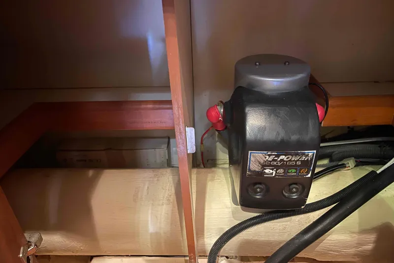 Slide: The Image of Electrical components in a 2010 Hunter 45 Center Cockpit, featuring Dometic and Micro-Air EasyStart devices. - 37