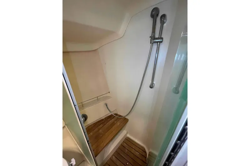 Slide: The Image of Electrical component inside 2010 Hunter 45 Center Cockpit boat, featuring cables and connections. - 39